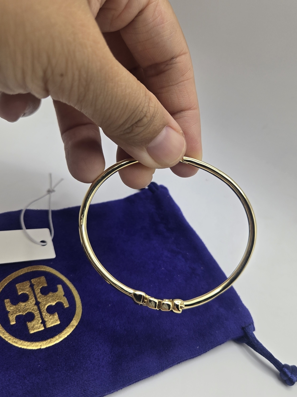New Tory Burch Gold Logo Hinge Bangle With Purple Pouch NWT - Picture 3 of 4
